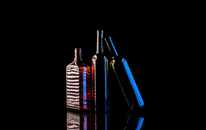 Neither Empty Nor Full: The Opened Bottle as Cinema's Most Eloquent Symbol of Unresolved Lives